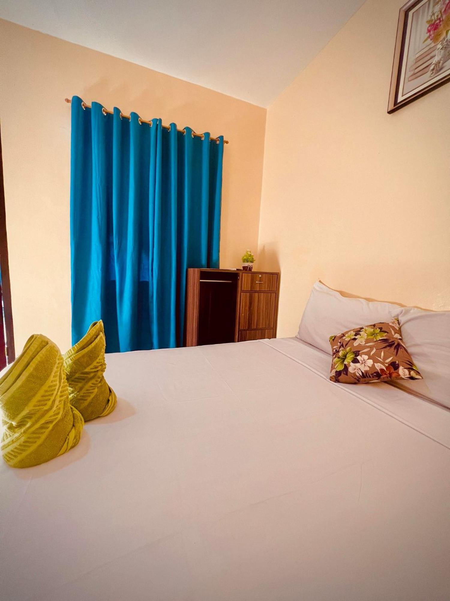 Indino Guesthouse Moalboal Bagian luar foto