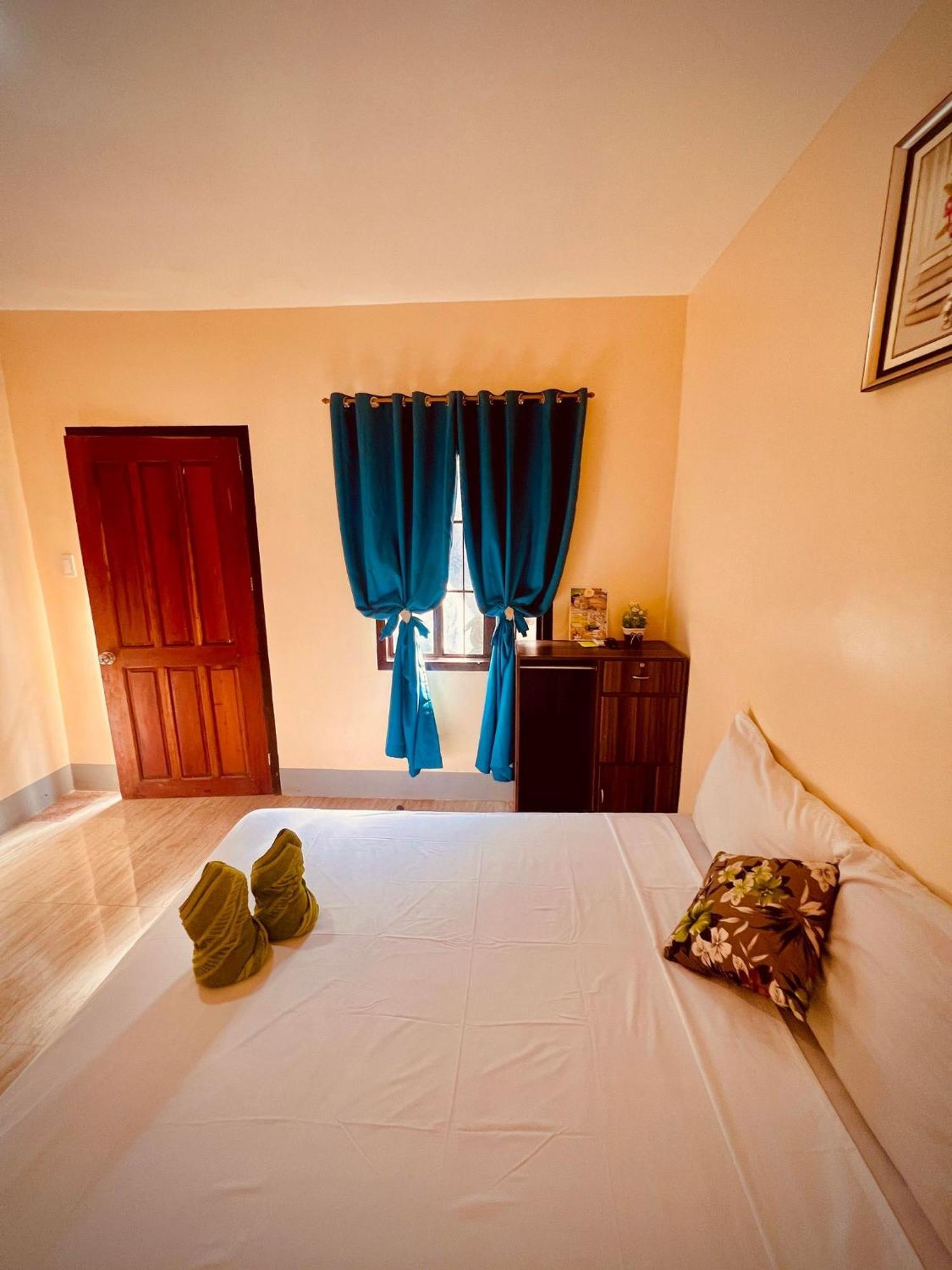 Indino Guesthouse Moalboal Bagian luar foto