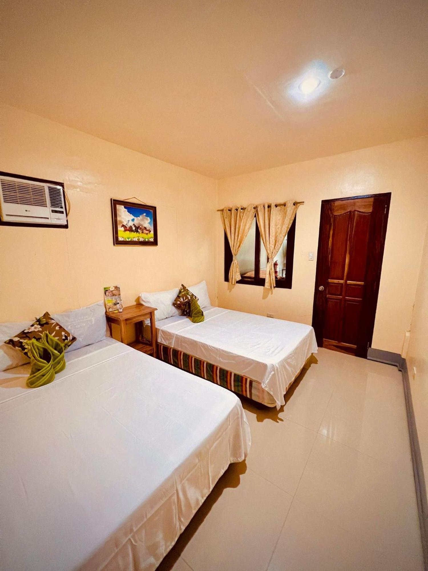 Indino Guesthouse Moalboal Bagian luar foto