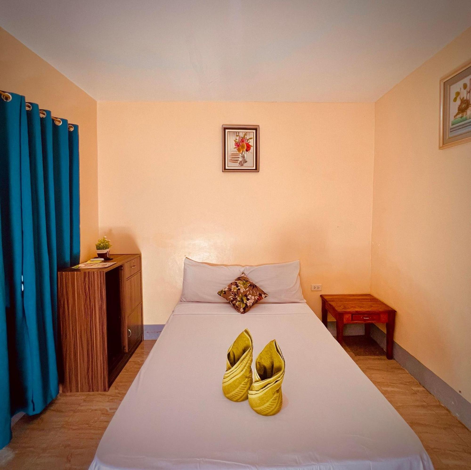 Indino Guesthouse Moalboal Bagian luar foto