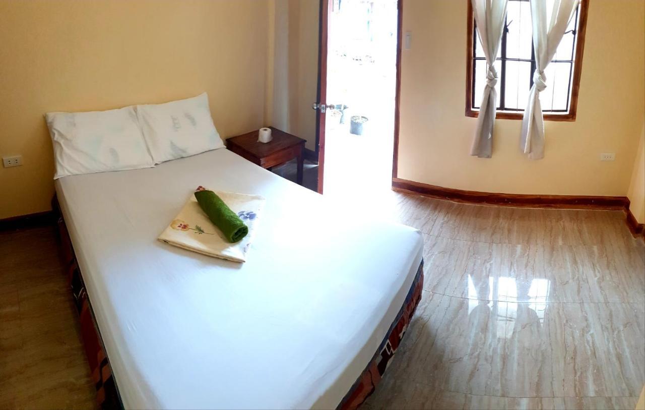 Indino Guesthouse Moalboal Bagian luar foto